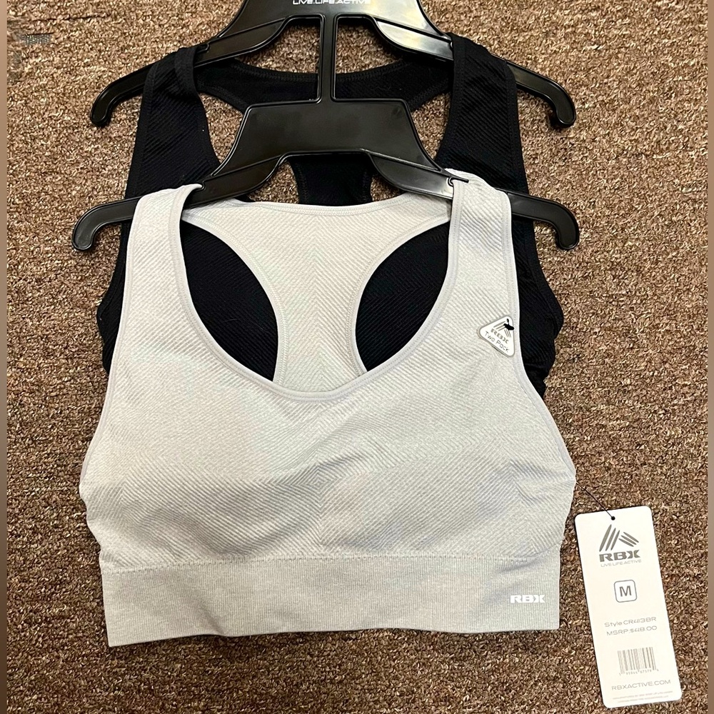 Pair of RBX Sports bras, grey and black, size M